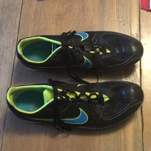 Used track shoes ,tool to get spikes, spikes, bag